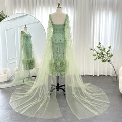 The elegant wedding party gown is shown from the back, highlighting its flowing silhouette.