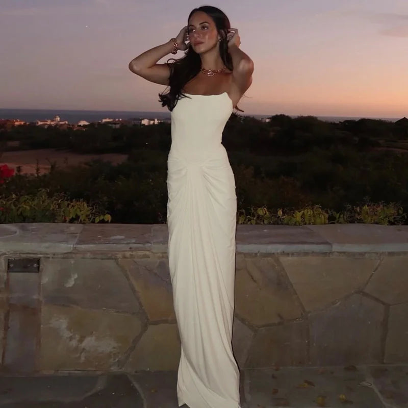 Elegant white strapless maxi formal gown shown for statement entrances