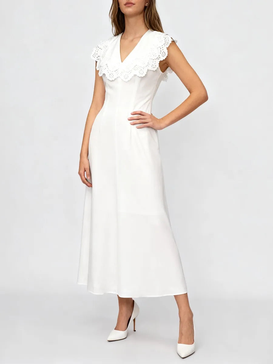 Front view of an elegant white sleeveless A-line dress.