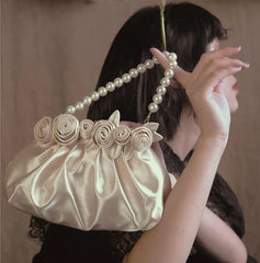 Floral pearl handle purse for weddings and evening wear

