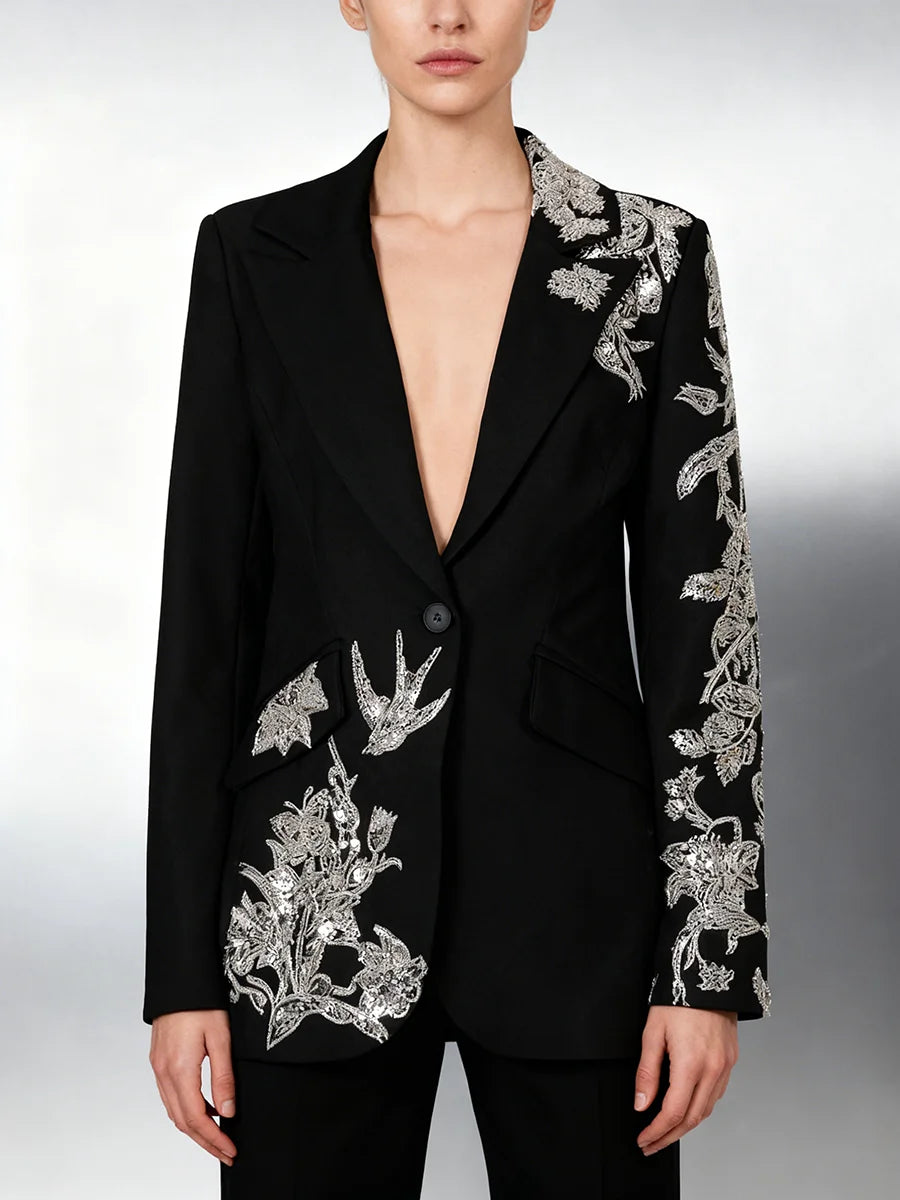 Tailored black blazer featuring beaded embellishment