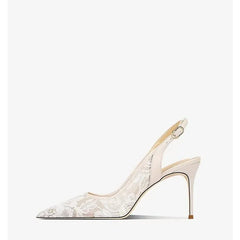 “Elegant wedding shoes styled with satin gown for ceremony”

