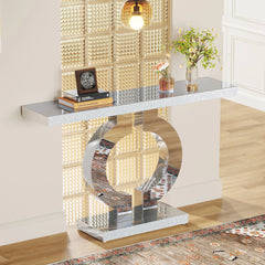 Entryway styled with 43 inch mirrored console table and decor