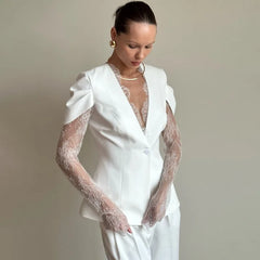 Lace sleeve blazer styled as an elevated evening layer