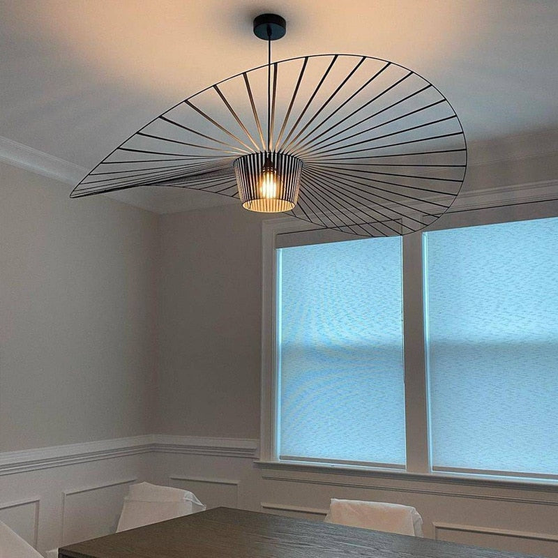  Modern LED Pendant Chandelier, a fusion of minimalist design and sculptural artistry. Its unique fan-like silhouette and fluid form bring elegance t the dining room set up.