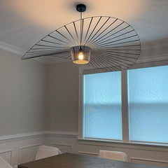  Modern LED Pendant Chandelier, a fusion of minimalist design and sculptural artistry. Its unique fan-like silhouette and fluid form bring elegance t the dining room set up.