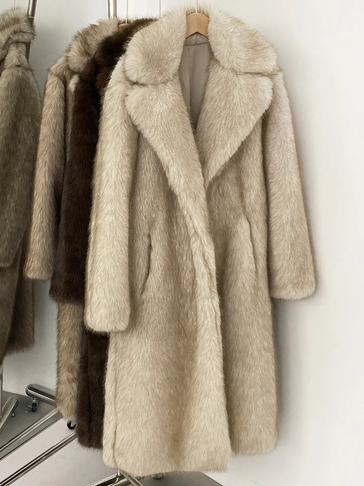Long faux-fur overcoat hanging on display