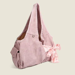 Feminine pink satin bow tote bag perfect for travel and campus