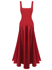 Outdoor styling on stone steps showing the fitted bodice and fluid skirt movement, creating a polished look for formal occasions.