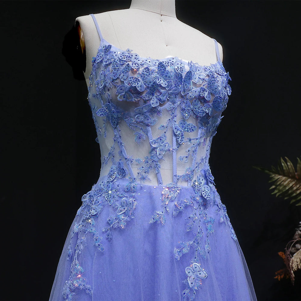 Formal tulle gown with embellished bodice and softly draped full skirt