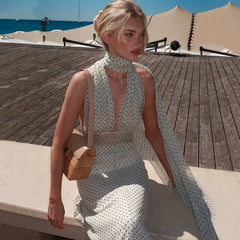 Floor length polka dot dress with slim silhouette