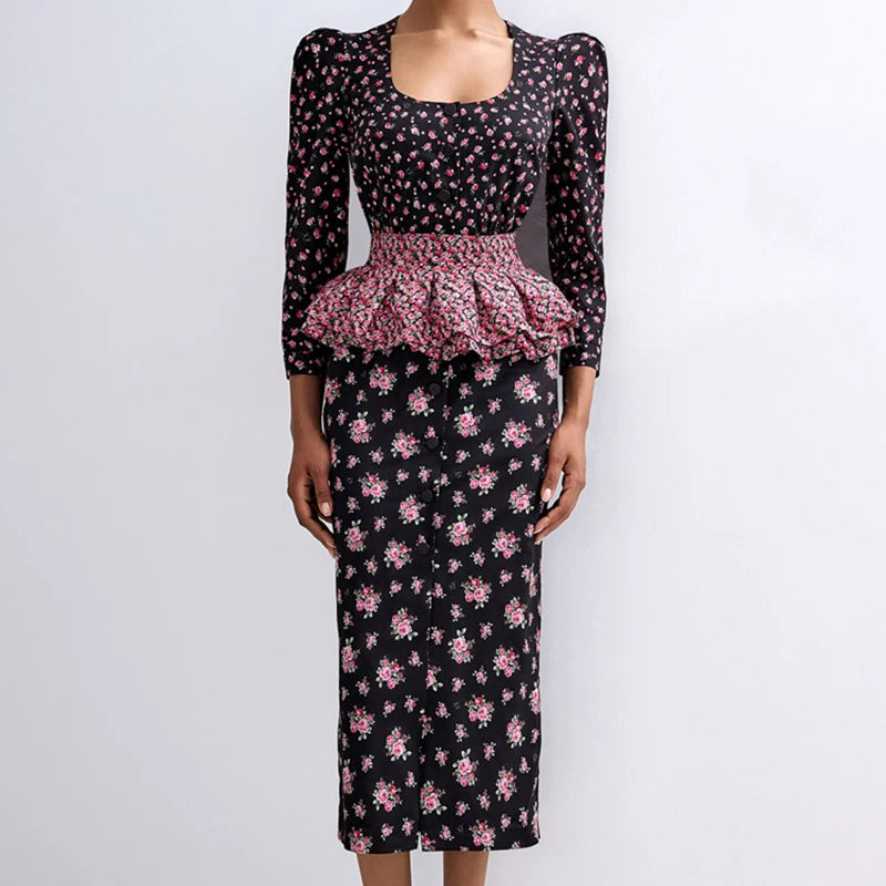 Front view of floral midi dress with peplum waist and long sleeves