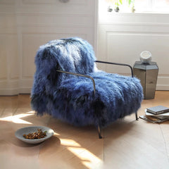 Close-up of fluffy upholstery and sleek stainless frame