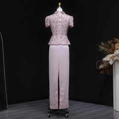 Indoor outfit shot showing the two-piece set’s refined silhouette, with the embellished top adding sparkle and the skirt keeping the look sleek.