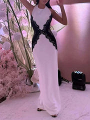 Women’s monochrome formal event dress styled for galas and high-impact evenings