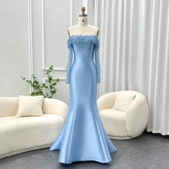 An exquisite formal party dress with a graceful silhouette and a boat neckline.