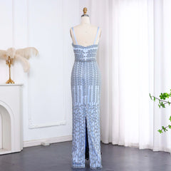 An exquisite formal party gown with a sweeping train, highlighting its graceful movement.