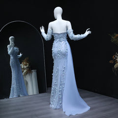 The back view of the stunning tulle dress, showing its flowing skirt and train.