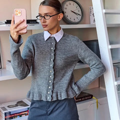 Slim knit cardigan with frill trim paired with relaxed casual trousers for weekend dressing