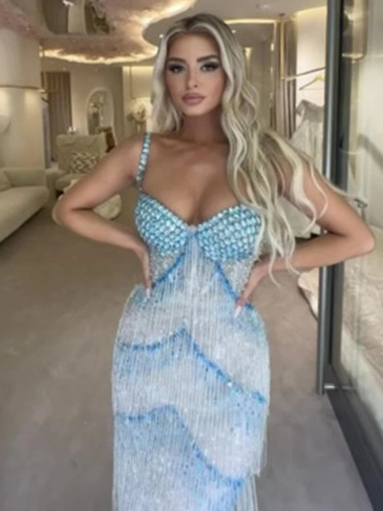 Fringe embellished blue red carpet gown featured for high-fashion inspiration