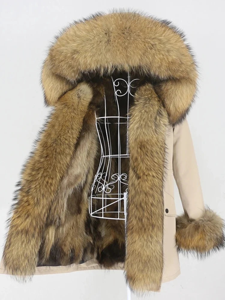 Detail focus on the fur cuff finish and smooth shell fabric, showing a neat sleeve shape designed for comfortable winter layering.