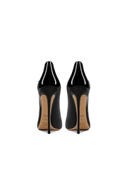 Pair of black high-heeled shoes on a white background