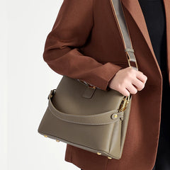 Leather shoulder crossbody bag with smooth grain texture and gold-tone hardware