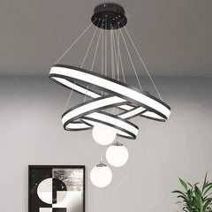 Geometric triple ring LED chandelier in a modern living room