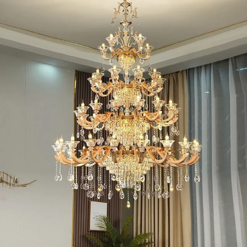 Gilded multi-tier crystal chandelier in a luxury double-height foyer
