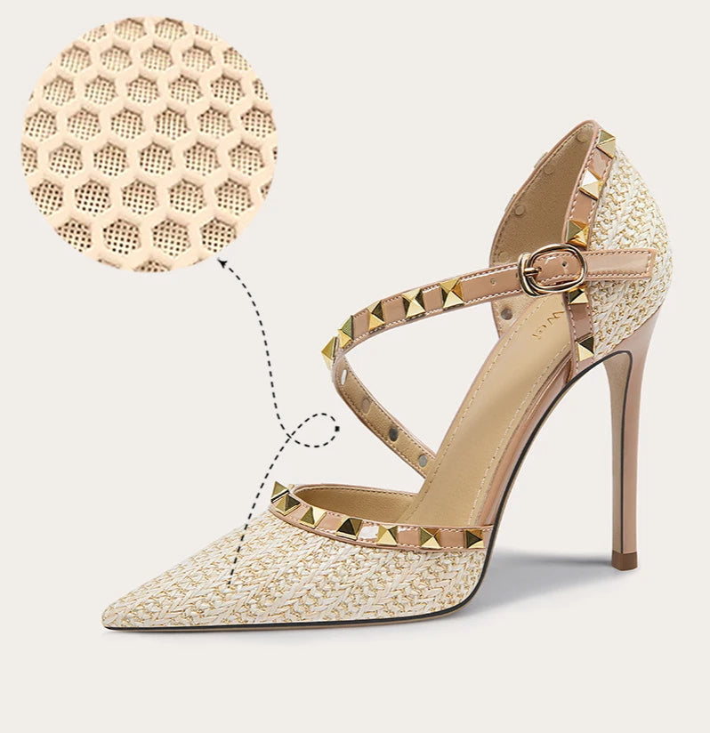 Glossy beige patent sandals with metal stud accents