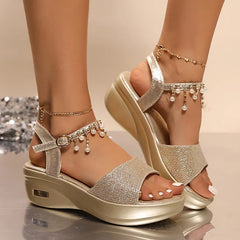 Women’s gold pearl strap sandals with wedge heels