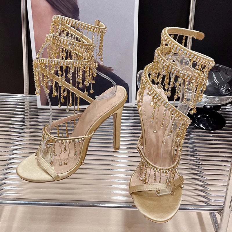 Gold rhinestone heels with crystal ankle fringe
