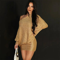 Woman wearing gold sequin V-neck long sleeve mini dress