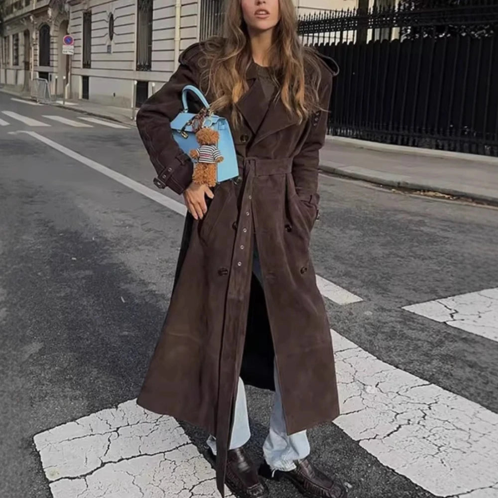 Street-style outfit featuring a coffee A-line trench coat