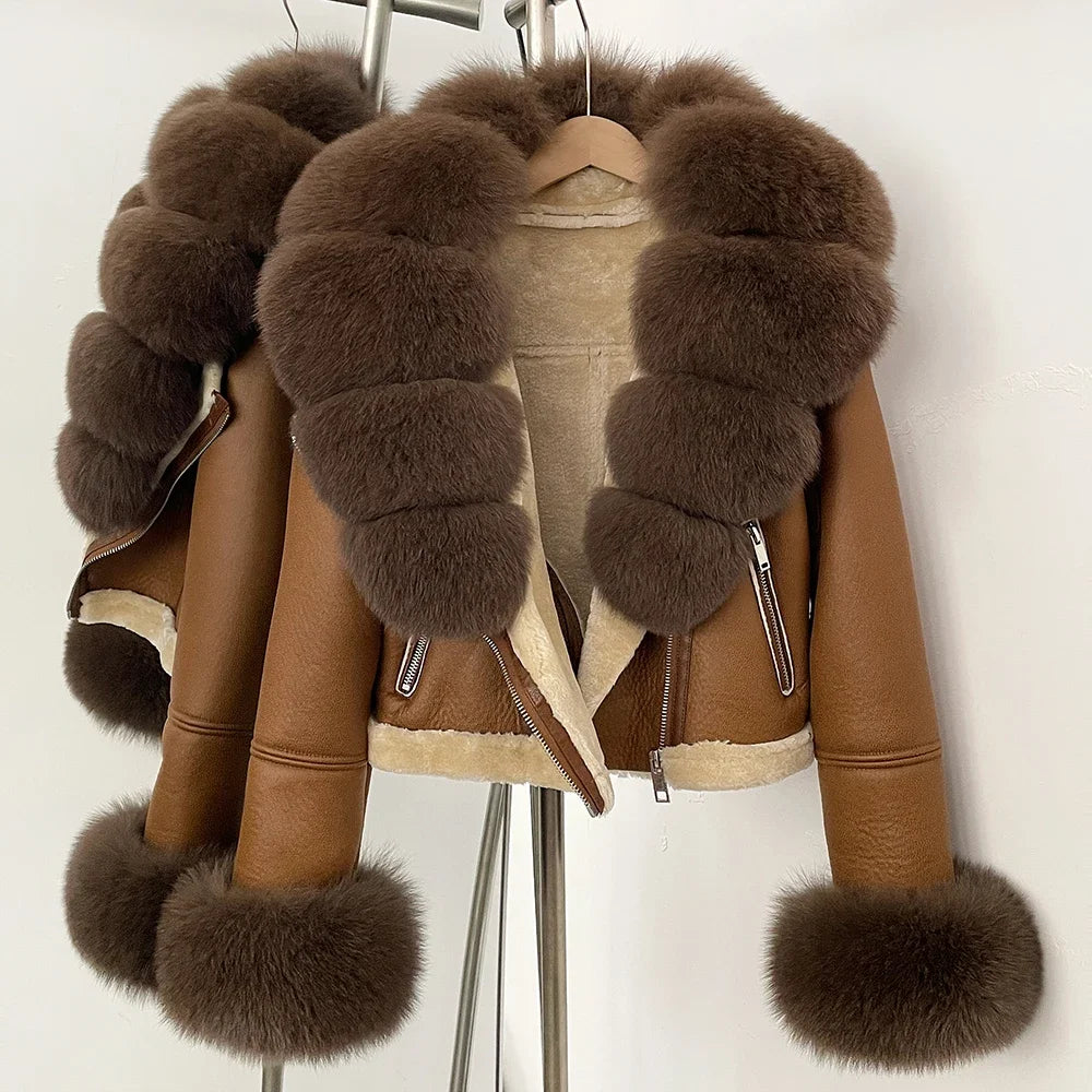 Close-up of the voluminous fur collar framing the neckline, showing dense texture and neat trim placement against faux leather.