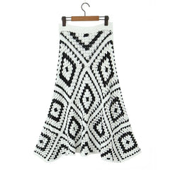 Graphic plaid pattern midi skirt for modern fall layering