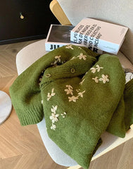 Women’s green cashmere knitwear with floral details