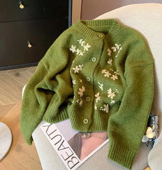 Green cashmere cardigan with delicate floral embroidery