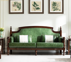 green leather sofa with wooden frame in classic living room