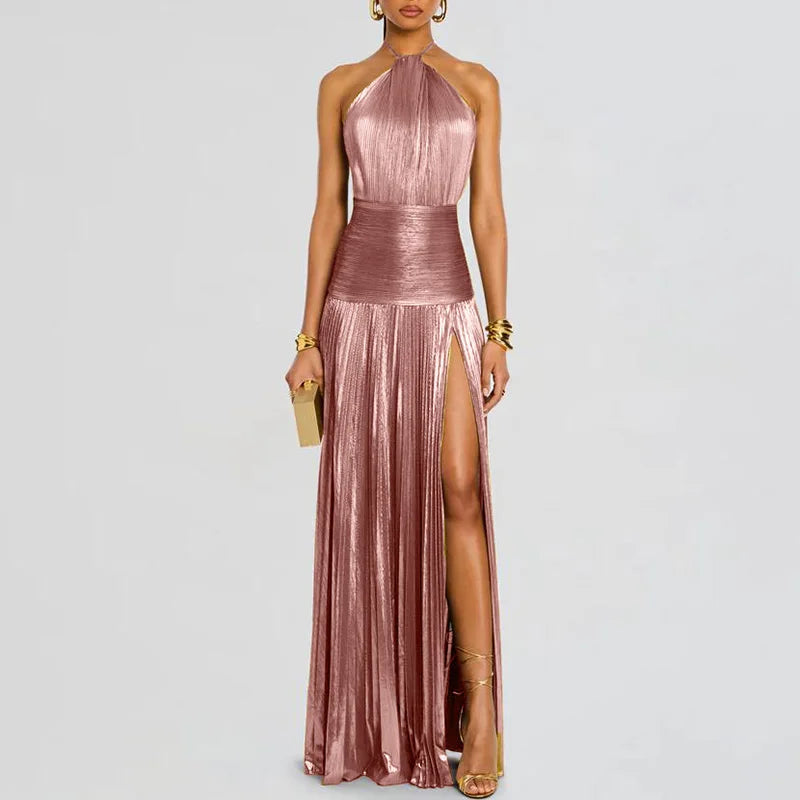 A woman wearing a halter high-split maxi dress in an elegant, modern style.
