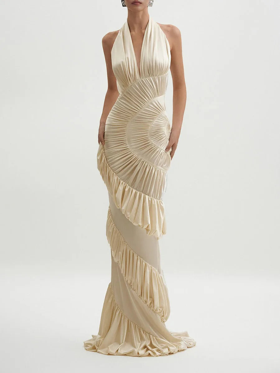 Beige halter maxi dress with sculptural pleats and ruffles
