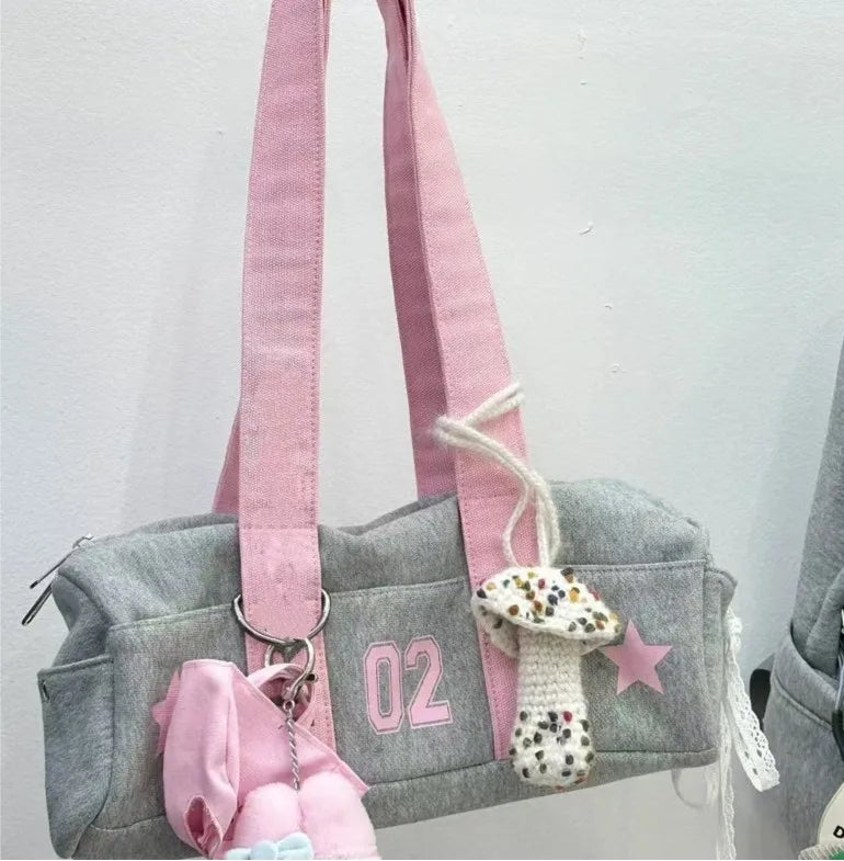 Grey Harajuku-style canvas bag with pink straps and mushroom charm