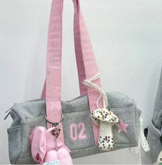 Grey Harajuku-style canvas bag with pink straps and mushroom charm