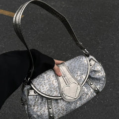 Bold Y2K satchel with leopard print and silver accents