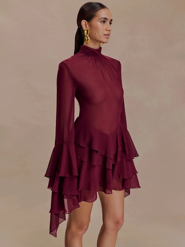 Backless sheer dress with long sleeves and soft ruffle layers