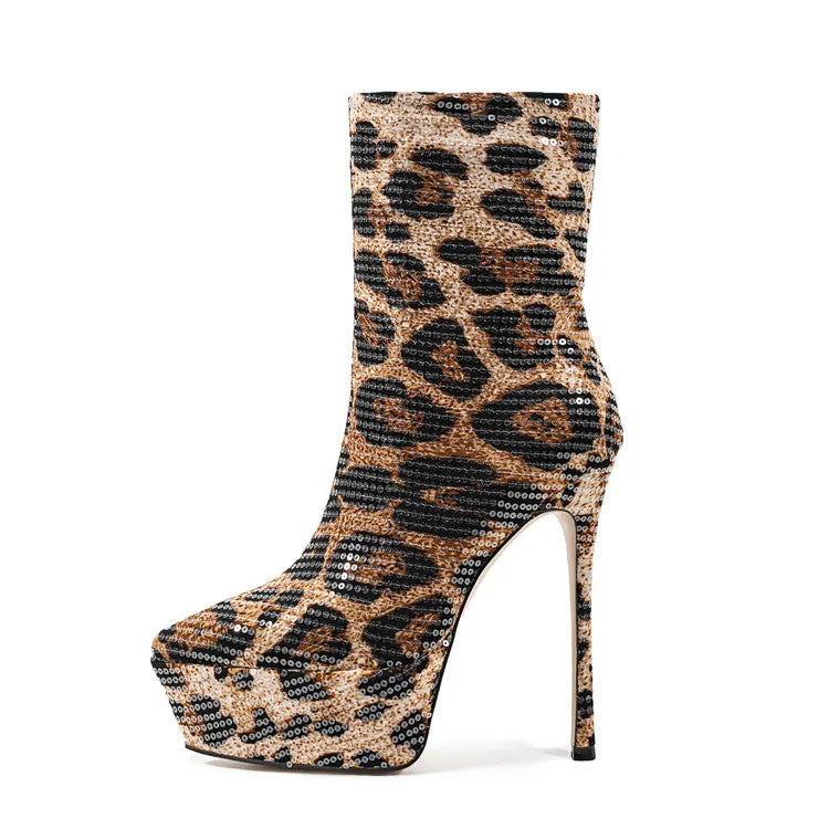 Platform boots with pointed toe and thin heel