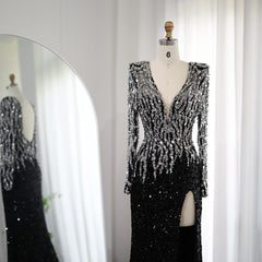 The glamorous black party gown is styled for a formal event.