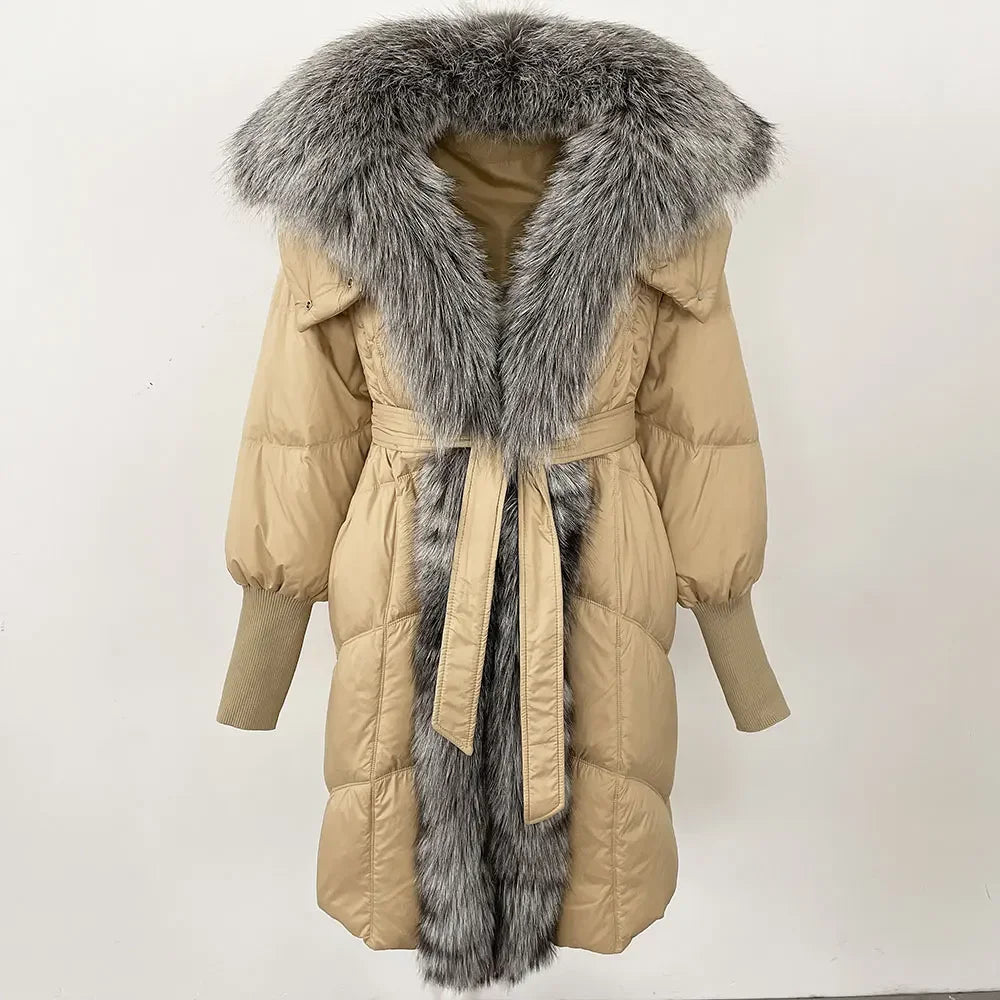 Studio image of a hooded puffer coat with clean lines, extended length, and winter-ready construction