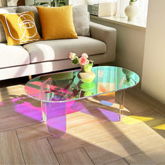 “Iridescent acrylic coffee table with oval shape and modern design”

