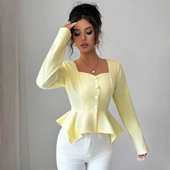 A full-length shot of a long-sleeve irregular patchwork shirt styled for a casual day out.